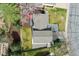 Aerial view of a well-maintained home with a spacious yard and mature trees providing ample shade at 2477 S Dover Way, Lakewood, CO 80227