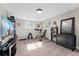 Spacious basement area that is set up as an exercise room, and is equipped with free weights and an exercise bench at 2477 S Dover Way, Lakewood, CO 80227