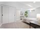 Comfortable bedroom with plush carpet, closet and ample space at 2477 S Dover Way, Lakewood, CO 80227