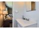 Bathroom sink featuring white fixtures at 6477 W Clifton Pl, Littleton, CO 80128
