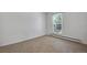 Bedroom showcasing neutral carpet and a window providing natural light at 8050 Niwot Rd # 40, Niwot, CO 80503
