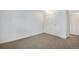 Bedroom showcasing neutral carpet and a closet with white bi-fold doors at 8050 Niwot Rd # 40, Niwot, CO 80503