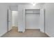 Bright bedroom features neutral carpet and spacious closet with bi-fold doors at 8050 Niwot Rd # 40, Niwot, CO 80503