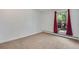 Bright bedroom with a large window, neutral carpet, and ample natural light creating a comfortable space at 8050 Niwot Rd # 40, Niwot, CO 80503