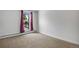 Inviting bedroom with large window views, soft carpet, and a serene atmosphere for relaxation at 8050 Niwot Rd # 40, Niwot, CO 80503