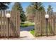 Exterior view of property beyond a fence with decorative lights on either side at 8050 Niwot Rd # 40, Niwot, CO 80503