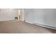 Bright living room with neutral carpet and white walls, offering a clean and spacious feel at 8050 Niwot Rd # 40, Niwot, CO 80503