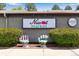 The Niwot Market sign with a couple of decorative painted hands on either side at 8050 Niwot Rd # 40, Niwot, CO 80503