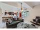 Cozy living room featuring an open floor plan, ceiling fan, and tiled floors at 384 S Ironton St # 314, Aurora, CO 80012