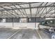 Covered parking with assigned spaces, including one with a vehicle visible at 384 S Ironton St # 314, Aurora, CO 80012
