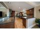 Modern kitchen featuring sleek countertops, stainless steel appliances, and stylish wood cabinetry at 5270 Tabor St, Arvada, CO 80002