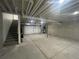 Unfinished basement with staircase at 9642 E Idaho Pl, Aurora, CO 80247
