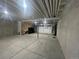 Unfinished basement with concrete flooring and walls at 9642 E Idaho Pl, Aurora, CO 80247