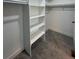 Spacious walk-in closet with built-in shelving and ample hanging space for organization at 9642 E Idaho Pl, Aurora, CO 80247