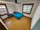 Cozy bedroom with hardwood floors and teal bedding at 3335 Dexter St, Denver, CO 80207