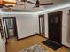 Bright entryway with hardwood floors and dark wood trim at 3335 Dexter St, Denver, CO 80207