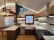 Updated kitchen featuring white subway tile backsplash and wood countertops at 3335 Dexter St, Denver, CO 80207
