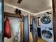 Laundry room with washer, dryer, and extra storage at 3335 Dexter St, Denver, CO 80207