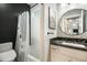 Stylish bathroom showcases a modern vanity with elegant finishes and a sleek shower with modern shower head at 3630 Mesa Verde Rd, Monument, CO 80132