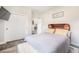 Cozy bedroom featuring a unique headboard, soft carpet and padding, and large closet at 3630 Mesa Verde Rd, Monument, CO 80132
