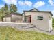 Modern home featuring a red front door, stylish accents, and inviting outdoor design at 3630 Mesa Verde Rd, Monument, CO 80132