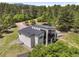 Stunning contemporary home featuring a private deck surrounded by lush forest views at 3630 Mesa Verde Rd, Monument, CO 80132