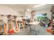 Spacious garage featuring an array of organized tools and ample workspace with natural light shining through the window at 3630 Mesa Verde Rd, Monument, CO 80132