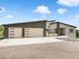 Contemporary home with a three-car garage and modern design at 3630 Mesa Verde Rd, Monument, CO 80132