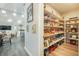 Walk-in pantry with ample shelving and organized storage solutions at 3630 Mesa Verde Rd, Monument, CO 80132