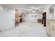Basement featuring carpet, natural light, and kitchenette at 2400 S Clayton St, Denver, CO 80210