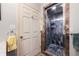 Bathroom featuring a glass enclosed shower with dark marble design at 2400 S Clayton St, Denver, CO 80210