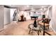 Basement includes a stairway, wet bar, pool table, and sitting area at 4892 S Robb St, Littleton, CO 80127