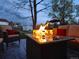 Cozy outdoor space with comfortable seating around a modern fire pit, ideal for relaxing evenings at 4892 S Robb St, Littleton, CO 80127