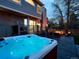 Relaxing hot tub with lounge area on the patio, creating an inviting outdoor retreat at 4892 S Robb St, Littleton, CO 80127