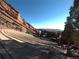 Iconic Red Rocks Amphitheatre showcasing the stage and natural rock formations under a clear sky at 4892 S Robb St, Littleton, CO 80127