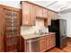 Updated kitchen with stainless steel appliances, granite counters, and a vintage cabinet at 1210 E Colfax Ave # 302, Denver, CO 80218