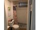 Bathroom with window and shower stall with curtain at 290 W 1St Ave, Broomfield, CO 80020