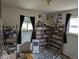 Bright bedroom featuring ample shelving for storage and organization, complemented by cozy decor and natural light at 290 W 1St Ave, Broomfield, CO 80020
