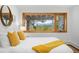 Cozy bedroom with a large window offering stunning mountain views at 1943 Columbine Ct, Golden, CO 80401