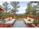Spacious deck with outdoor seating, mountain views, and a bright seating arrangement at 1943 Columbine Ct, Golden, CO 80401
