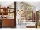 Stylish kitchen with white countertops, wood cabinets, and large windows showcasing scenic views at 1943 Columbine Ct, Golden, CO 80401