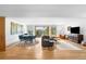 Stylish living area with open design, hardwood floors, mountain view, and modern furnishings at 1943 Columbine Ct, Golden, CO 80401