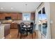 Eat-in kitchen with granite counters, stainless appliances, and a view of the backyard at 2776 Badlands Ct, Castle Rock, CO 80109