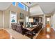 Bright living room with vaulted ceilings, fireplace, and comfortable seating at 2776 Badlands Ct, Castle Rock, CO 80109