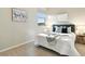 Cozy bedroom with neutral color scheme and accent pillows on bed at 10751 Fairway Vistas Ct, Littleton, CO 80125