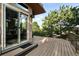 Spacious outdoor deck with views and access to the dining room through sliding glass door at 10751 Fairway Vistas Ct, Littleton, CO 80125