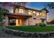 Spacious two-story home features a large balcony, manicured backyard, mature landscaping, and private patio at 10751 Fairway Vistas Ct, Littleton, CO 80125