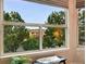 Expansive exterior views from home's oversized view window at 10751 Fairway Vistas Ct, Littleton, CO 80125