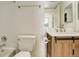 Bathroom with updated vanity and a bathtub at 2575 S Syracuse Way # 108, Denver, CO 80231