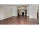 Condo kitchen with stainless steel appliances and wood floors at 2575 S Syracuse Way # 108, Denver, CO 80231